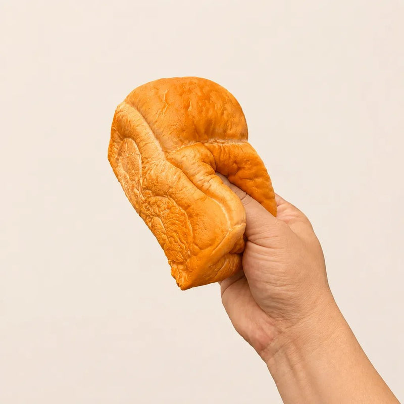 Squishy Realistic Slow Rise Bread Squishy Brown, zachte squishy in de vorm van een brood